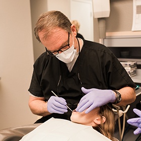 Smiling man in dental chair