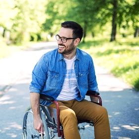 person smiling in a park