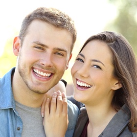 Man and woman smiling together