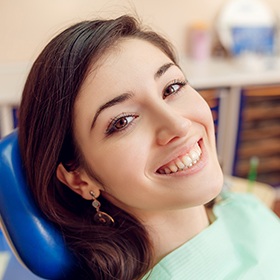 Smiling woman in dental chair