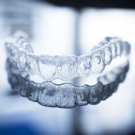 Clear Invisalign tray on tabletop