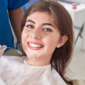 Smiling woman in dental chair