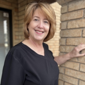 Headshot of dental hygienist Kam