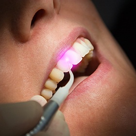 Patient receiving laser dental treatment