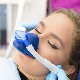 Relaxed woman with nitrous oxide nasal mask