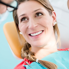 Smiling woman in dental chair