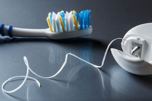 dental floss and brush