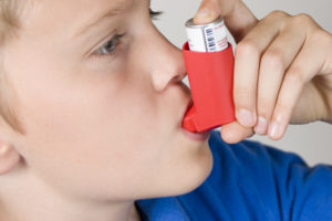 child with inhaler